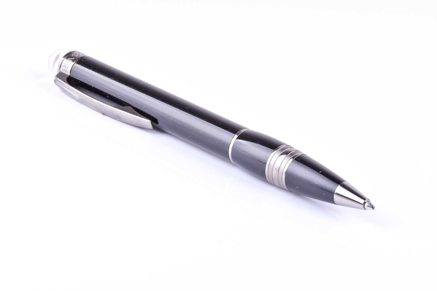 A Montblanc ballpoint pen, with black resin body and black polished metal mounts, with clear rein - Image 2 of 7