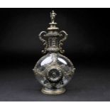 A Hanau silver encased glass liqueur bottle, 19th century, the screw top with figural knop, the