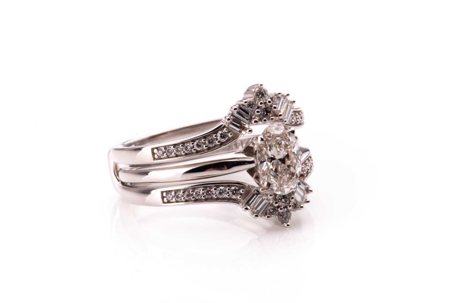 A 14ct white gold and mixed oval-cut solitaire diamond ring, the oval-cut diamond of approximately - Image 2 of 4