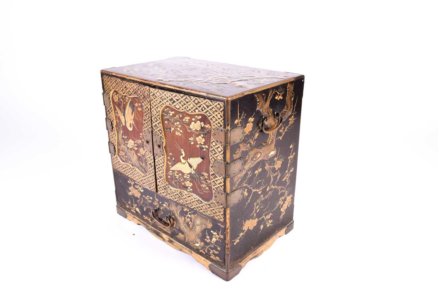 A Japanese lacquer Kodansu, Meiji period, of rectangular form with engraved metal mounts, with