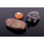 A 19th century carved horn snuff box in the form of a tortoise, a Geo III copper snuff box, of