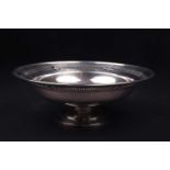 A George V silver fruit bowl, Chester 1924 by Barker Brothers, with pierced rim on a stepped