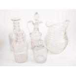 A small collection of early 19th cut glass, comprising a beer jug, an oil bottle with stopper, a