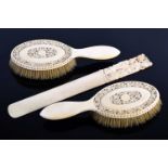 A good pair of Canton carved ivory hair brushes, circa 1870, each finely and deeply carved with