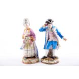A pair of Meissen figures of the Racegoer and his companion, 19th century, he dressed in a blue