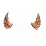 A pair of 18ct yellow gold and diamond wing earrings, each set with three rows of graduated round