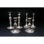 Three pairs of Spanish pressed silver candlesticks, 20th century, struck 925, 896 grams, 15 - 21cm