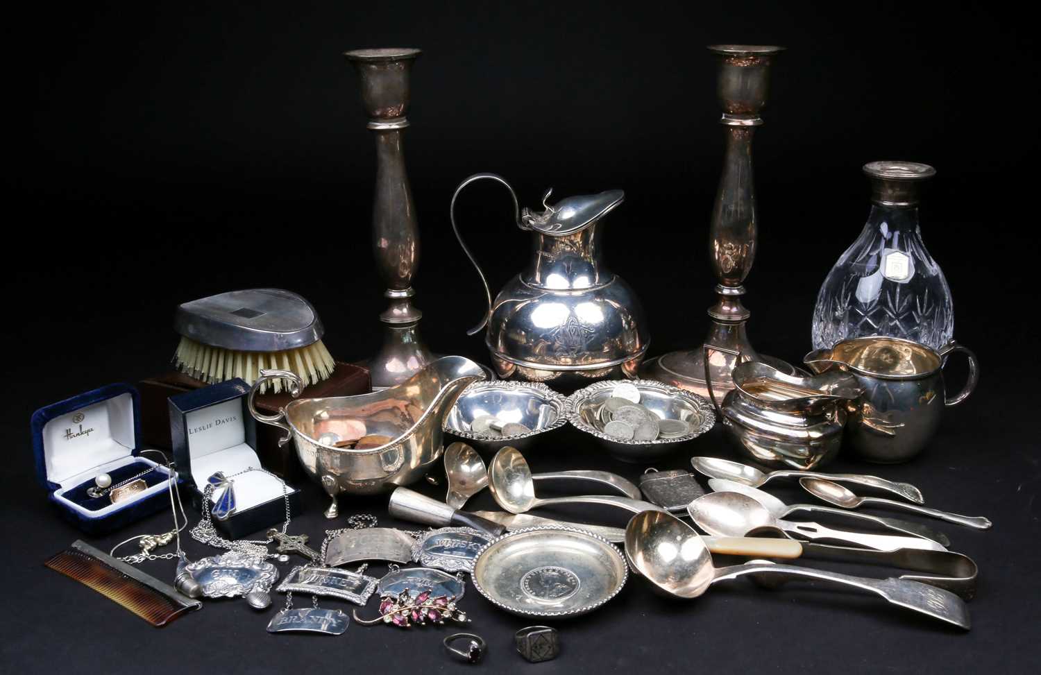 A mixed group of silver and white metal items, to inlcude flatware, cream jugs, a sauce boat,