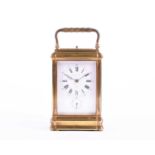 A late 19th century French gilt brass four-glass carriage clock, marked 'AM', possibly for