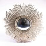 A large contemporary sunburst mirror, with 45cm diameter convex mirror glass, and muted pastel