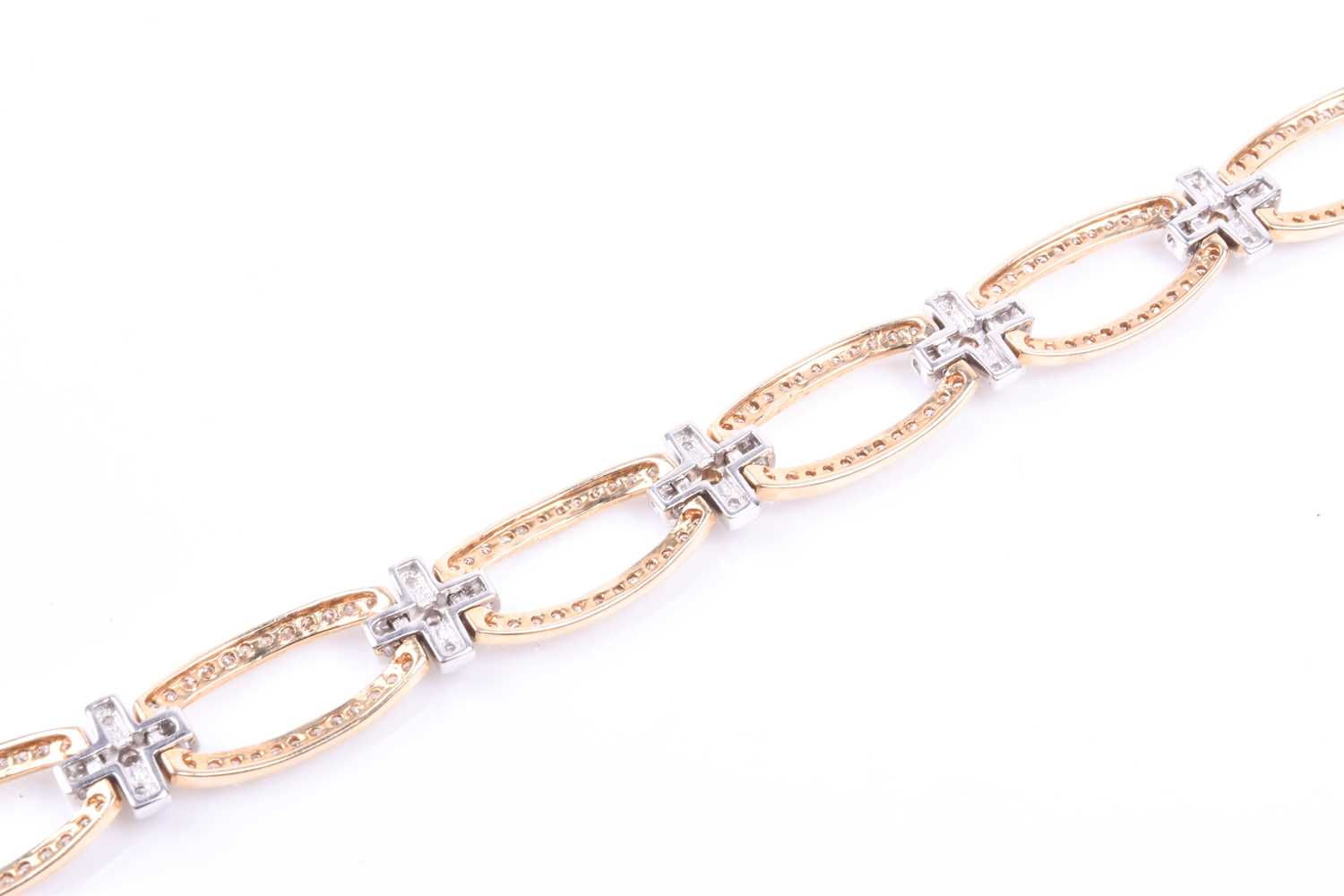 A 14ct yellow and white gold and diamond bracelet, comprised of openwork oval and square segments, - Image 4 of 5