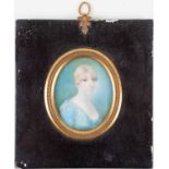 An 18th century oval portrait miniature on ivory, head and shoulders protrait of a lady, in an