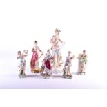 A group of Volkstadt porcelain figures emblematic of the arts, a figure of venus and a tall figure