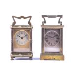 Two late 19th century gilt brass four-glass carriage clocks, each with circular dial, one with