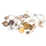 A group of silver and white metal items of jewellery, including a rose metal mounted silver coin (