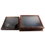 A 19th-century tabletop bijouterie display case, leather-bound with lock, together with a wall-
