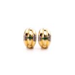 A pair of 18ct yellow gold, diamond, and emerald earrings, of curved design, inset with emeralds and