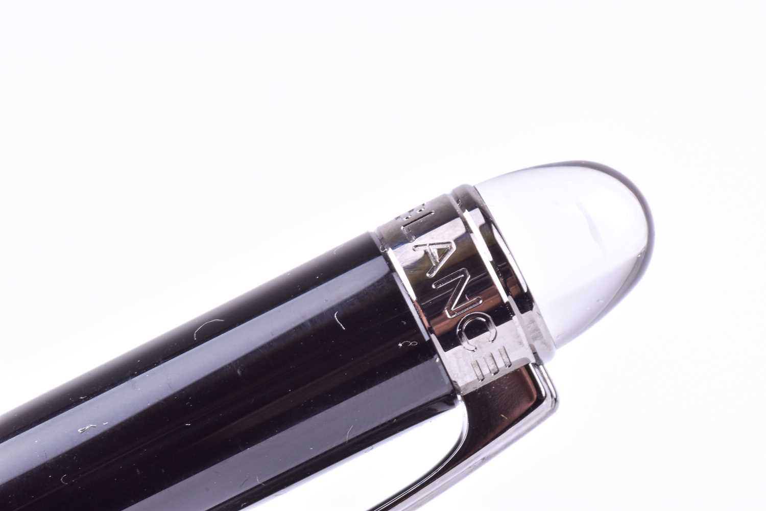 A Montblanc ballpoint pen, with black resin body and black polished metal mounts, with clear rein - Image 3 of 7