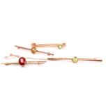 A 9ct yellow gold and peridot bar brooch, approximately 6.5 cm wide, together with a 9ct rose gold