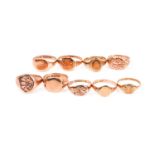 A Victorian / early 20th century 9ct rose gold ring with engraved decoration to oval shank, size