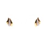 Leo Pizzo. A pair of Italian 18ct yellow and white gold earrings, circa 1960s, of swept lobe form,