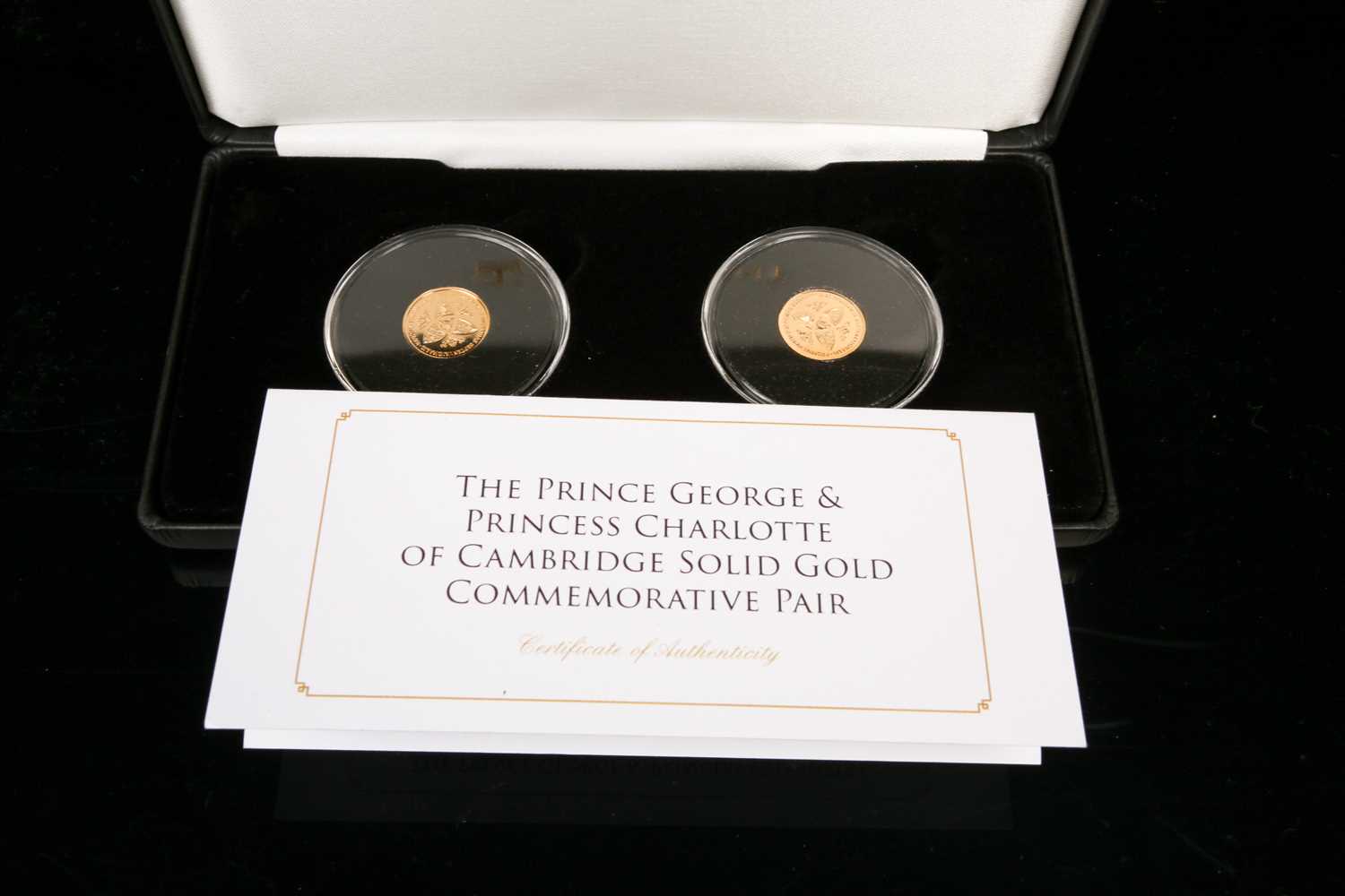 The Prince George & Princess Charlotte of Cambridge 9ct gold commemorative medallions, proof like