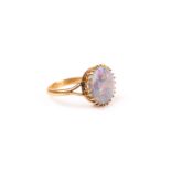 A yellow gold and opal ring, set with a round polished opal (stone a/f), multi-claw set, shank