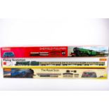 Three boxed Hornby 00 Gauge train sets, comprising R1019 Flying Scotsman, R1094 The Royal Scot and