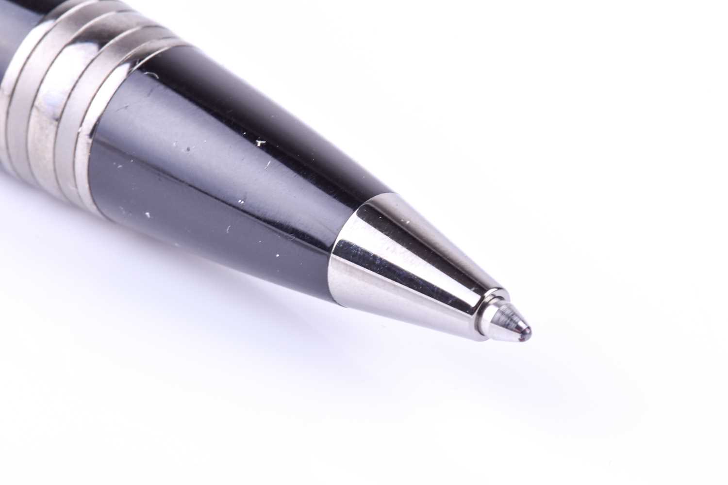 A Montblanc ballpoint pen, with black resin body and black polished metal mounts, with clear rein - Image 6 of 7