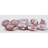 Neun Kunzite, zus. 43,86 ct.Verschiedene Schliffarten und natürliche Rosatöne, innere Merkmale,