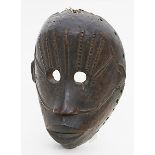 Afrikanische Maske.Holz, geschnitzt. Altersspuren. Kongo. H. 23 cm.