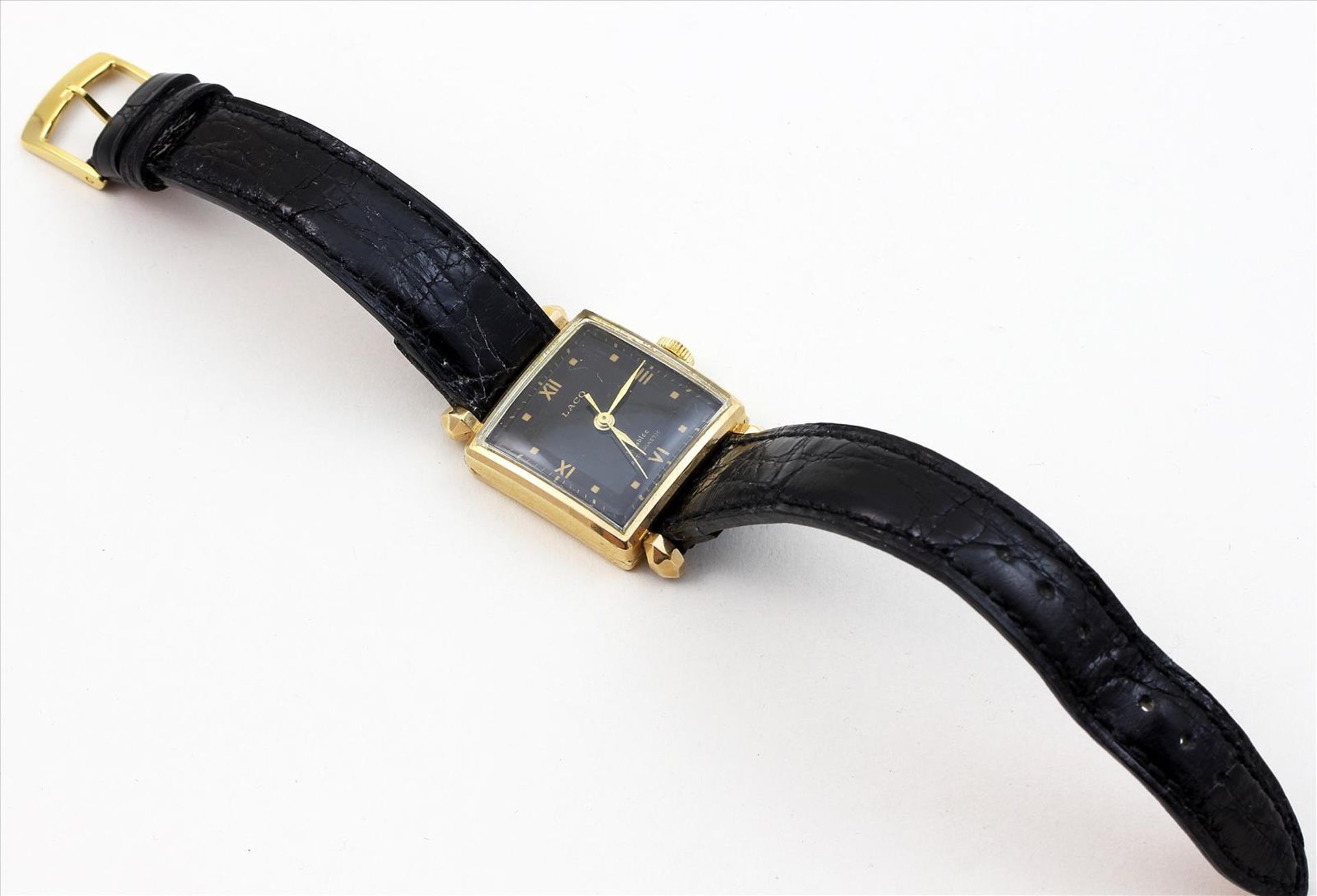 Art Deco-Herrenarmbanduhr "LACO".585/000 RG-Gehäuse und -Bandanstösse. Schwarzes Zifferblatt mit