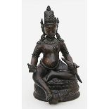 Padmasambhava.Bronze mit dunkelbrauner Patina. Der Gott des Reichtums auf doppeltem Lotossockel