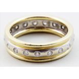 Memory-Ring.585/000 GG und WG, brutto 6,3 g. Umlaufend besetzt mit 19 Brillanten, zus. ca. 0,4 ct.