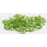 Ca. 70 Peridote, zus. ca. 55 ct.Je oval facettiert, teils natürliche Einschlüsse.