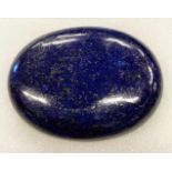 Großes Lapislazuli-Cabochon, 328,95 ct.Oval, D. 57x 42 mm.