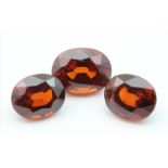 Drei Mandarin-Granate (Spessartine), zus. ca. 14 ct.