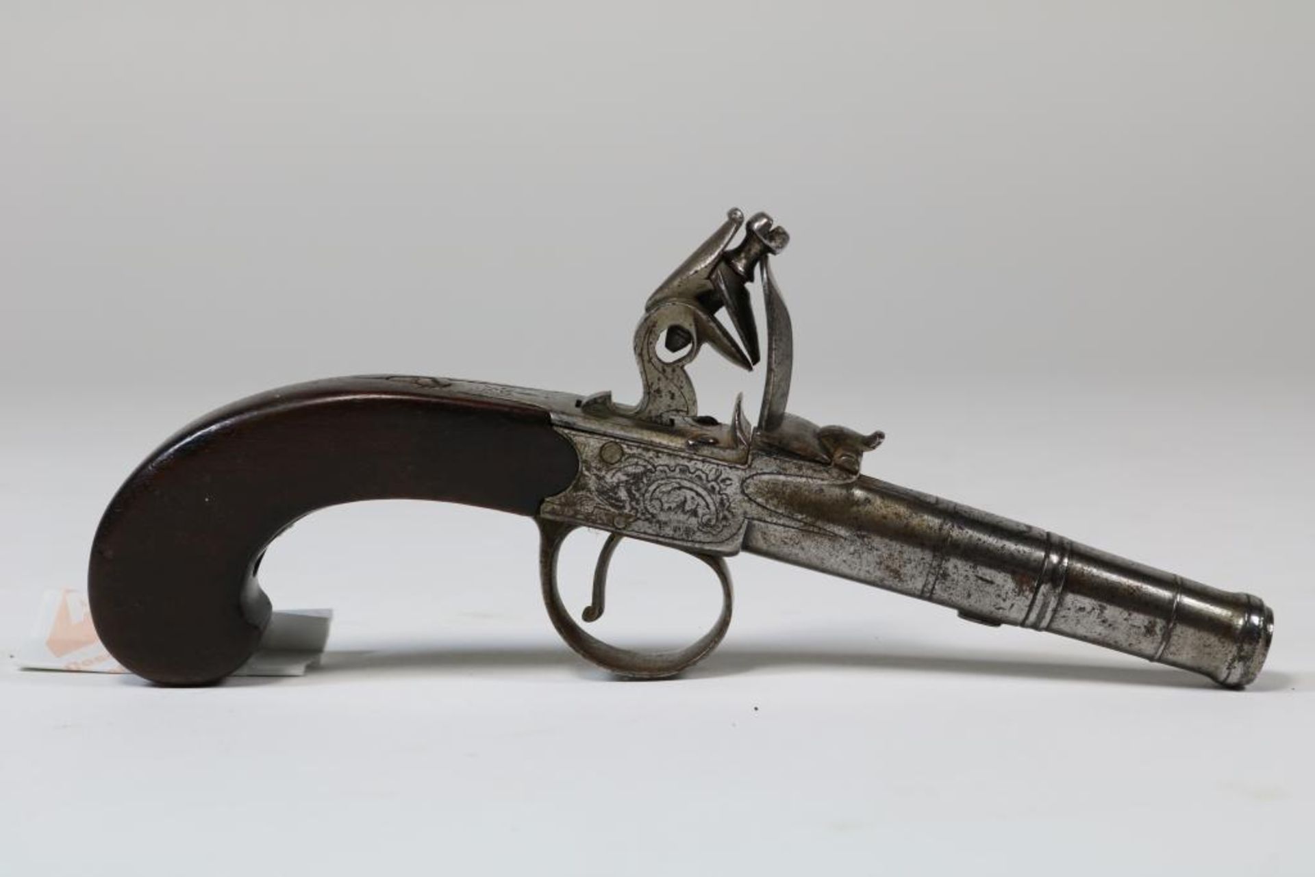 Vuursteen damespistool voorzien van merktekens, mogelijk Engeland ca. 1800, l.20 cm.