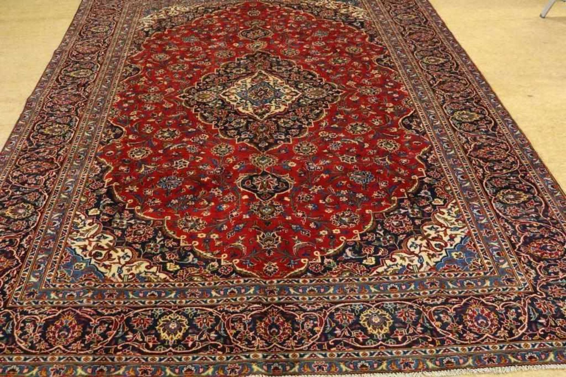 A carpet, Kashan, 376 x 280 cm.