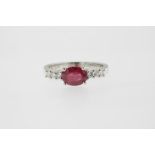 A white gold ring with brilliants 0.26ct., ruby 1.62ct. 750/000 size 17 3/4