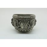 A silver temple bowl, Myanmar/Birma, gross w. 773gr, diam. 20cm.Een zilveren tempelschaal,