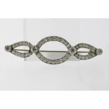 A white gold brooche set with old european and brilliant cut diamonds, Art Deco, gross w. 6.1gr,