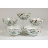 a set of 5 porcelain bowls, China 19th century.Serie van 5 geribde porseleinen kommen met famille