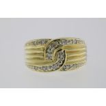 A yellow gold ring set with diamonds, 750/000, gross w. 5.5gr, seize 17.Een geelgouden ring bezet