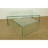 Lot of a curved glass design side tables, h. 36, w. 119, d. 60 cm. And a matching side table, h