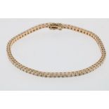 A rose gold tennisbracelet, set with brilliant cut diamonds, total ca. 2.70ct, 750/000, gross w.