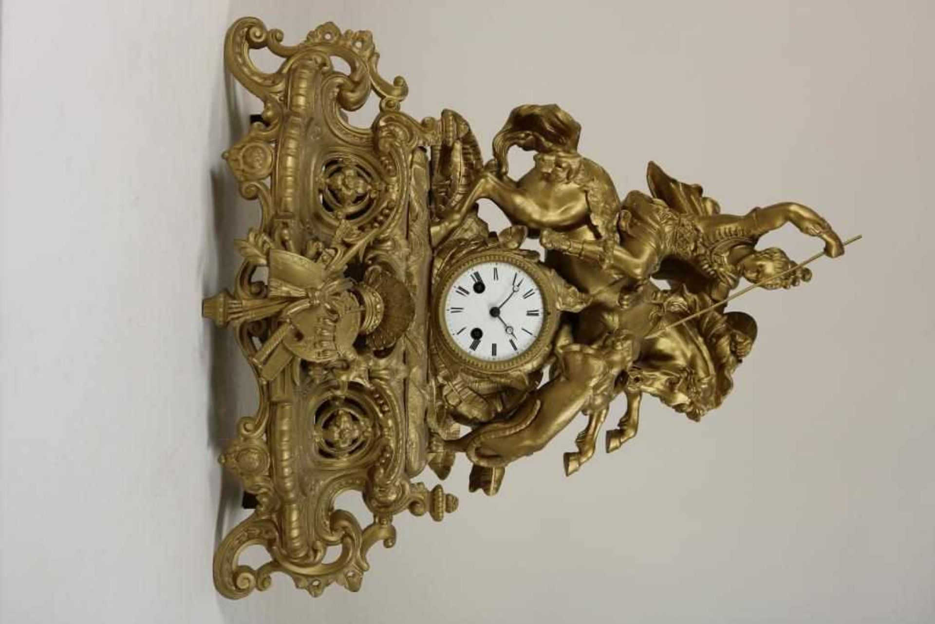 Zamak clock with rider on horseback figting panther, France ca, 1850-1870., h. 53 cm.Pendule in