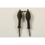 Two Nigerian cast brass Edan staff heads of the Yoruba people, h. 12 cm.Stel bronzen Edan stafjes