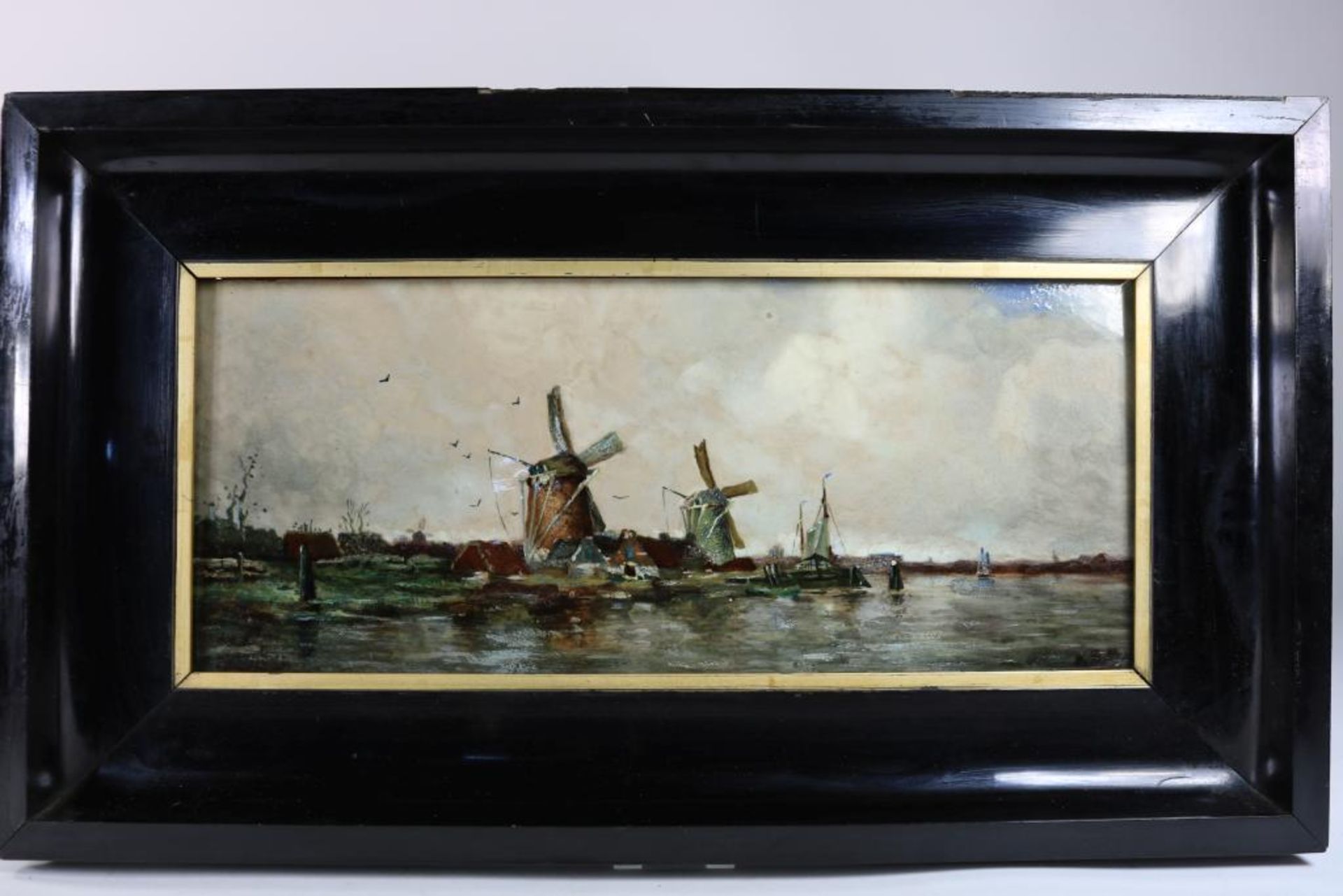 Polychrome handpainted plaquer, with windmales, marked: Rozenburg The Hague, 1904, 20 x 47 cm.