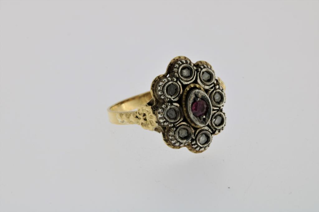 A yellow gold dress ring set with rubies and diamonds set in silver, Portugal, seize 17.5.Een